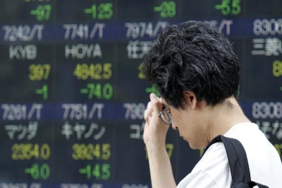 Stocks easier on Asian markets, but losses limited