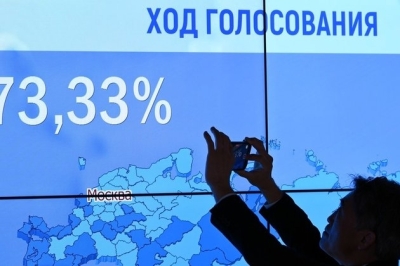 Putin set for landslide win Russia’s election commission
