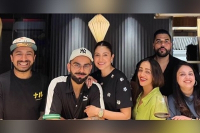 Anushka, Virat twin in black as they step out for date, poses with fans
